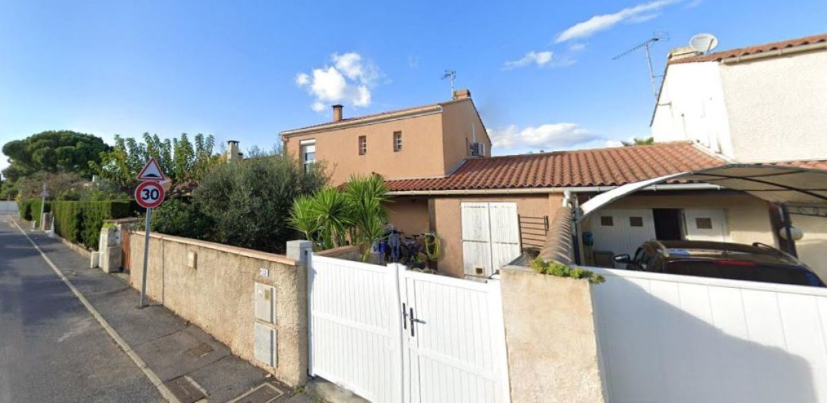 Une maison avec un petit jardin à Lattes