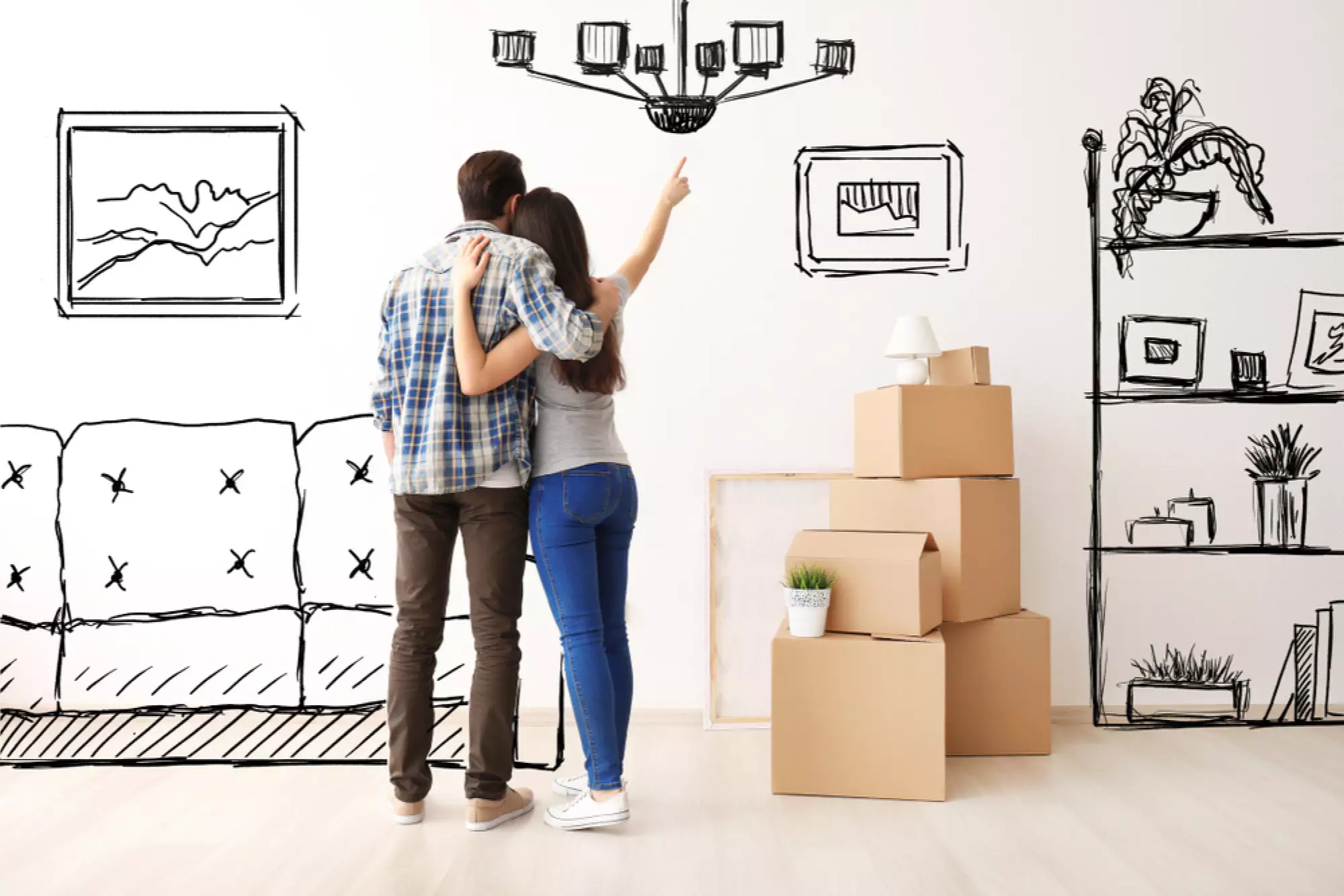 un couple se projette en dessinant des meubles sur les murs d’un appartement vide